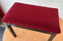 Load image into Gallery viewer, Polished black piano stool with red velour top & storage