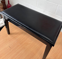Load image into Gallery viewer, Black polished piano stool with leatherette top and storage