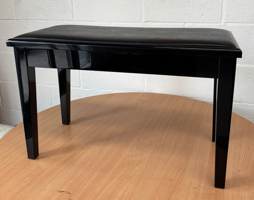 Black polished piano stool with leatherette top and storage