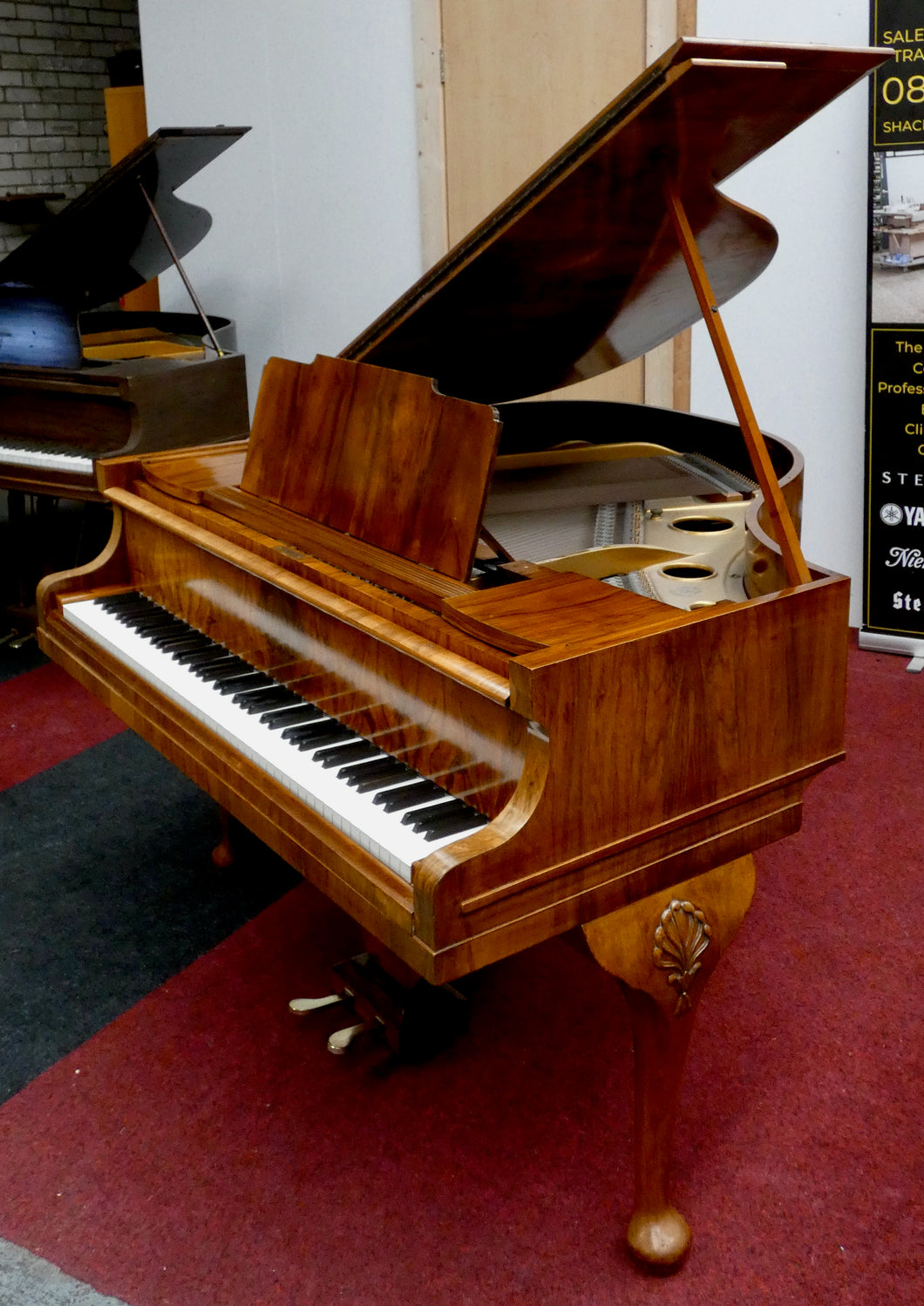 Chappell Baby Grand in figured Walnut finish