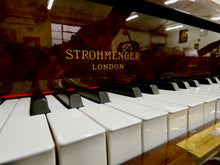 Load image into Gallery viewer, J. Strohmenger Baby Grand Piano With Half-Moon Lid in book matched burl walnut