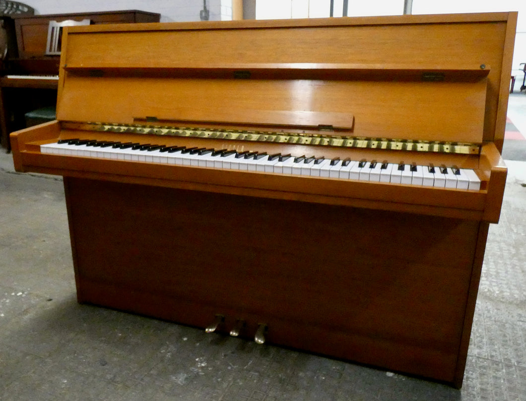 Rippen studio piano in mid century design