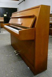 Rippen studio piano in mid century design