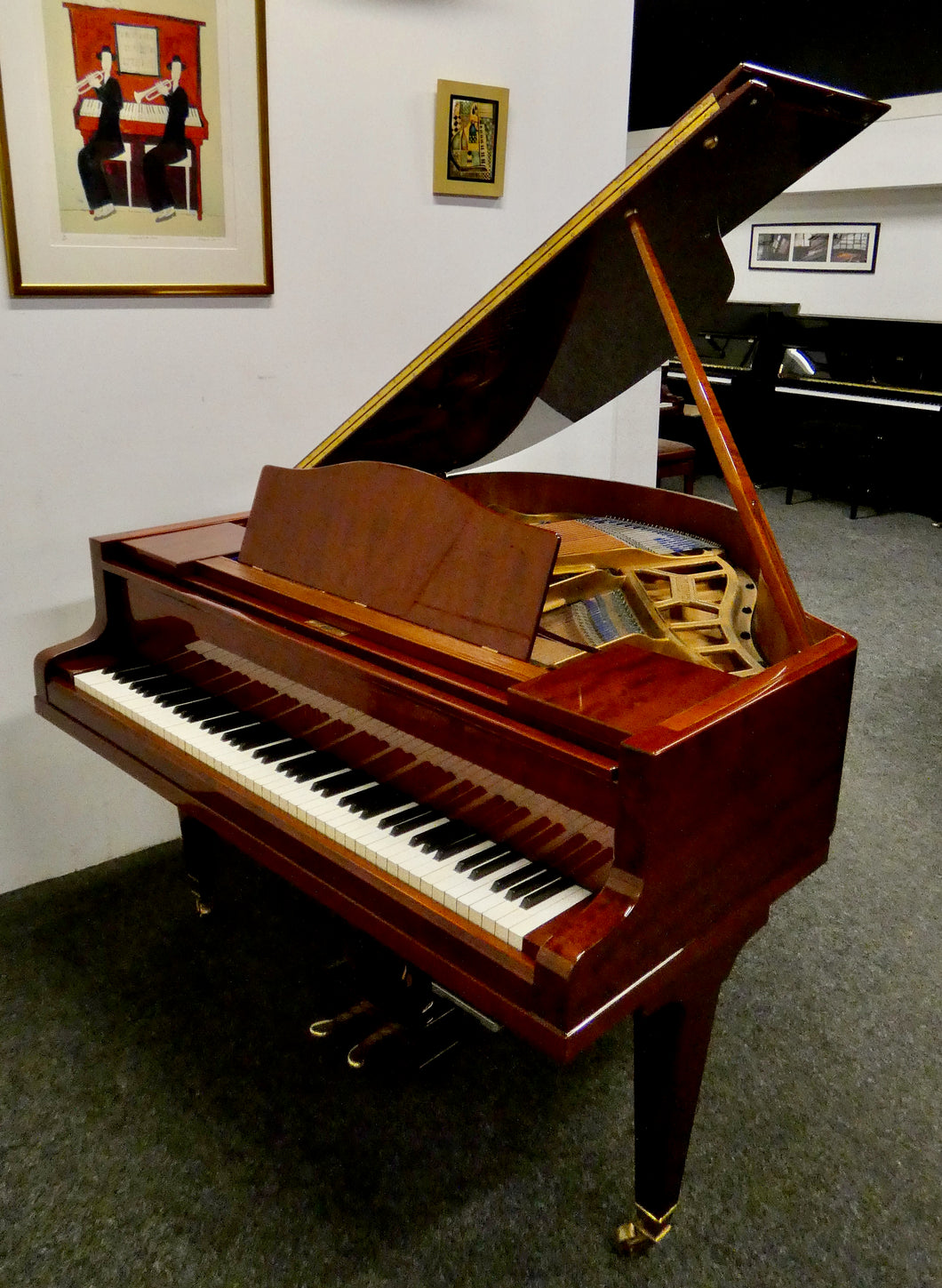 Blüthner Style 4 Baby Grand in flame mahogany gloss finish