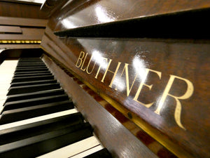 Blüthner Antique Model D Upright Piano in Flame Mahogany Cabinetry