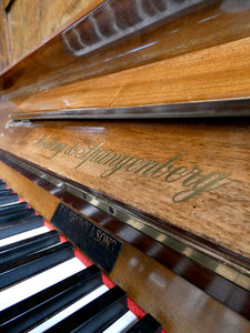 Hoelling & Spangenberg Antique Upright Piano in Burr Walnut Finish